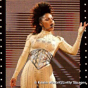 Janet Jackson sur la scène du "Rock With U" Tour