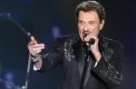 Johnny Hallyday ému aux larmes hier soir sur scène (son)