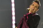 Les Brit Awards vont honorer Robbie Williams
