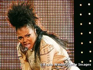 Janet Jackson sur la scène du "Rock With U" Tour