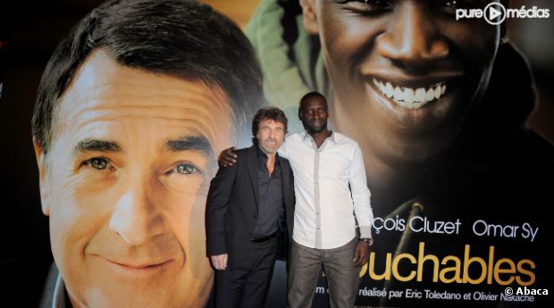 Omar Sy et François Cluzet à une projection du film "Intouchables"