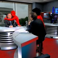 Vidéobuzz : des hommes en rouge débarquent en direct sur BFM TV