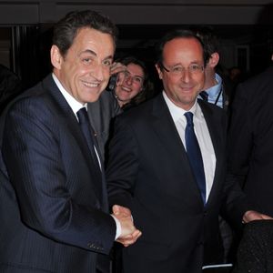 Nicolas Sarkozy et François Hollande, lors du dîner annuel du Crif le 8 février 2012.