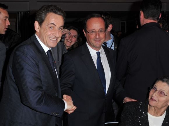 Nicolas Sarkozy et François Hollande, lors du dîner annuel du Crif le 8 février 2012.