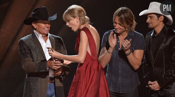 15. George Strait (à gauche)