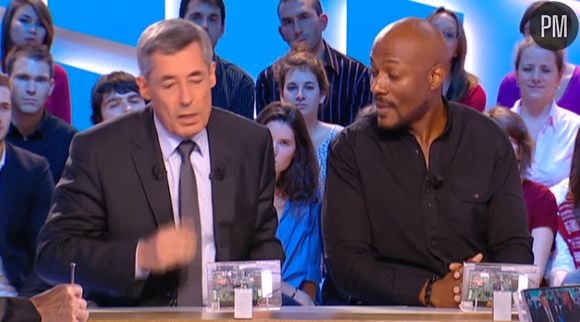 Henri Guaino et Harry Roselmack sur le plateau du "Grand Journal" de Canal +.