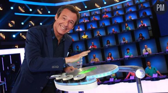 Jean-Luc Reichmann sur le plateau du jeu "Au pied du mur".