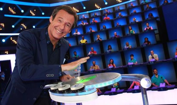 Jean-Luc Reichmann sur le plateau du jeu "Au pied du mur".