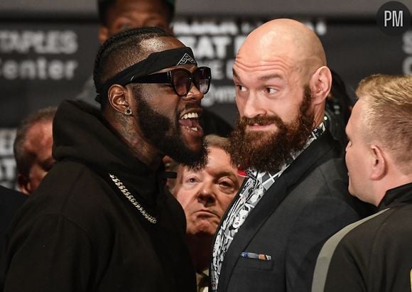 Deontay Wilder à gauche, et Tyson Fury à droite, en 2018