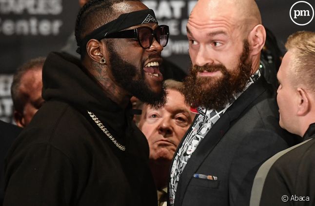 Deontay Wilder à gauche, et Tyson Fury à droite, en 2018