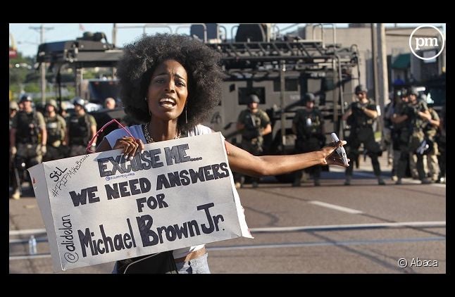 Une manifestante à Ferguson le 13 août 2014