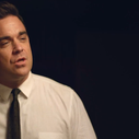 Clip : Robbie Williams acteur et chef d'orchestre dans "Different"