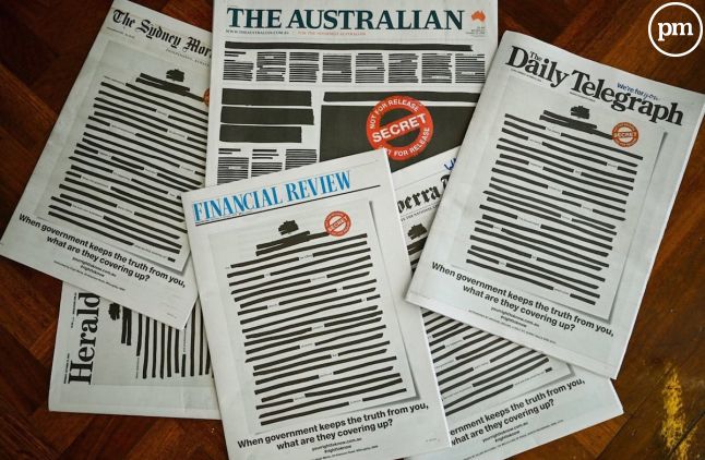 Les médias australiens recouverts d'encre noir.
