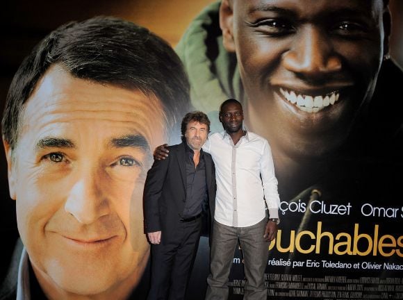 Omar Sy et François Cluzet à une projection du film "Intouchables"