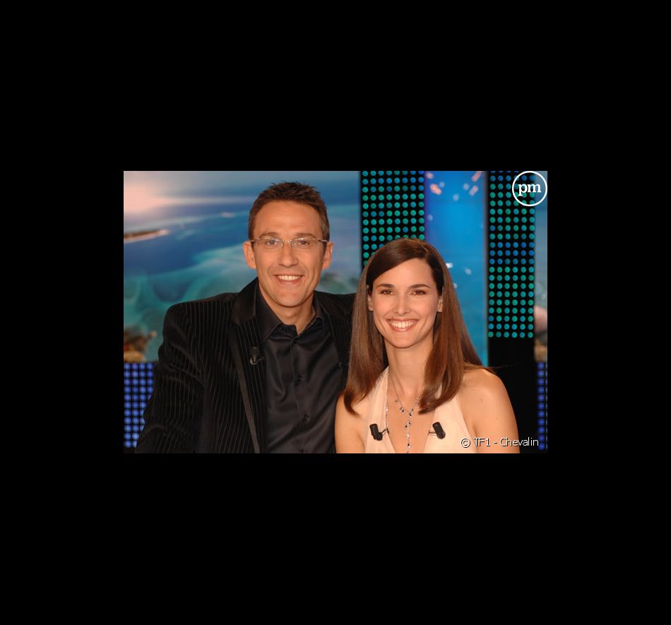 Julien Courbet et Églantine Emeyé lors de l'enregistrement des "10 commandements des vacances" (TF1) le 15 mai 2007