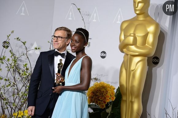 Lupita Nyong'o aux côtés de Christoph Waltz après son Oscar pour "12 years a slave"