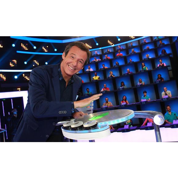 Jean-Luc Reichmann sur le plateau du jeu "Au pied du mur".