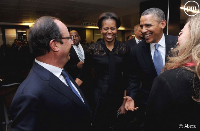 François Hollande face à Barack Obama, lors de l'hommage à Nelson Mandela.