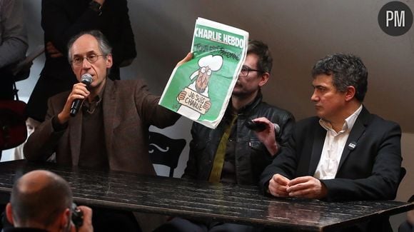 Gérard Biard, rédacteur en chef, Luz, dessinateur et Patrick Pelloux, médecin chroniqueur, lors d'une conférence de presse, le 13 janvier 2015